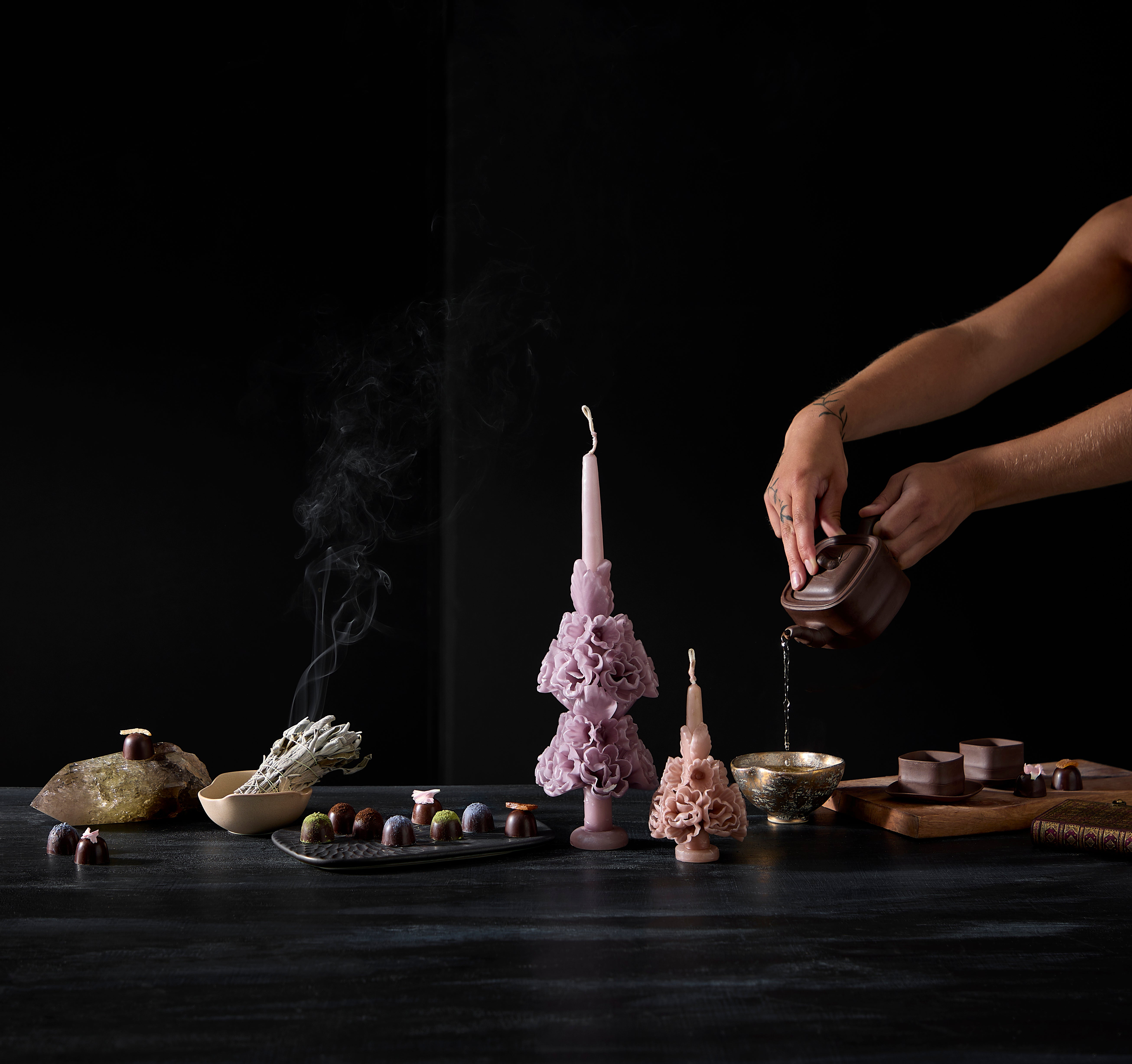 Chocolate Truffles set at a table with lavender and pink candles