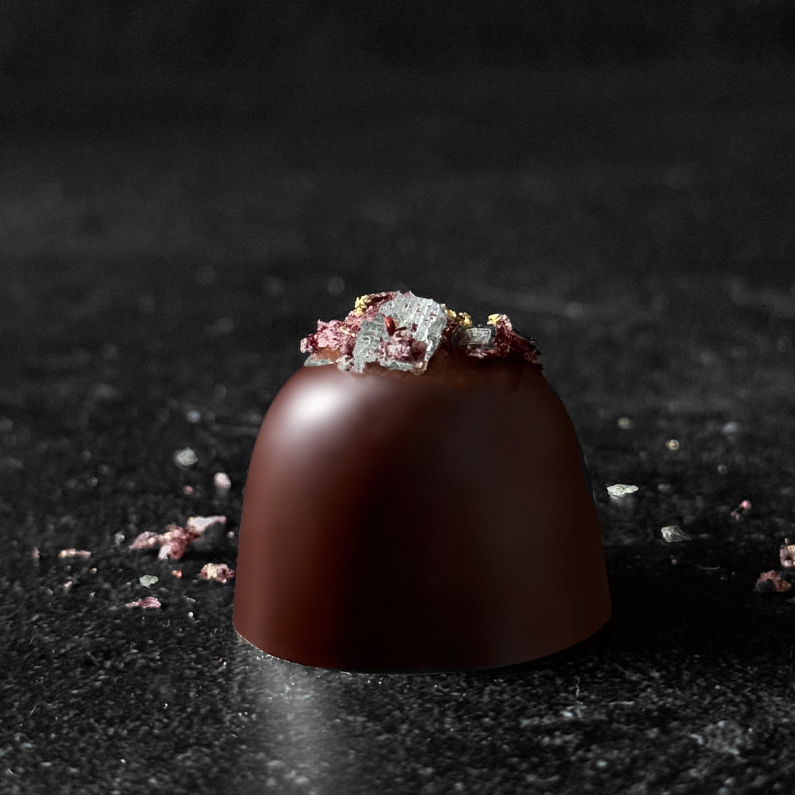 Dark Chocolate Truffle blended with coconut puree and topped with 24 Kt gold