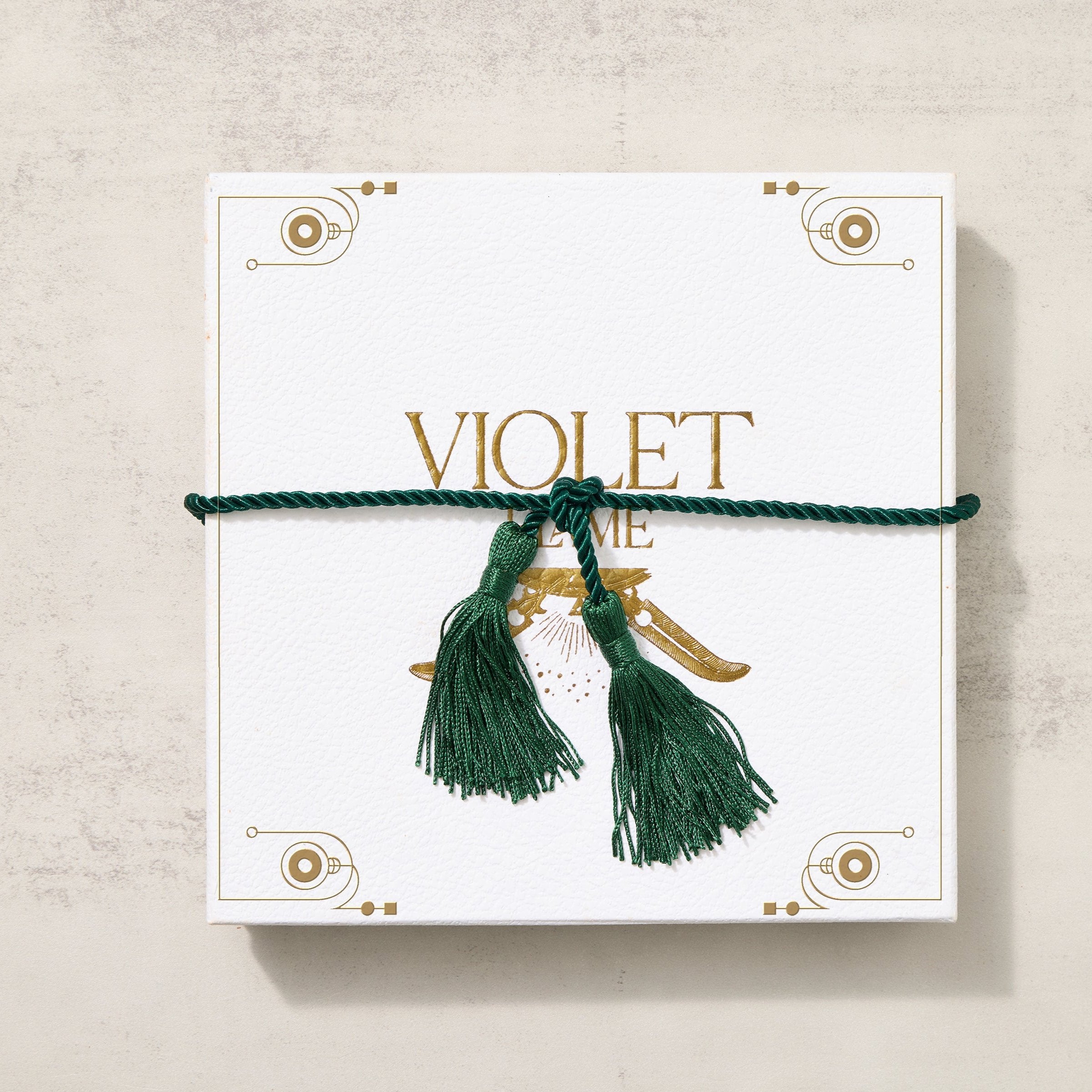 White Violet Flame Gift Box perfectly tied with green tassel